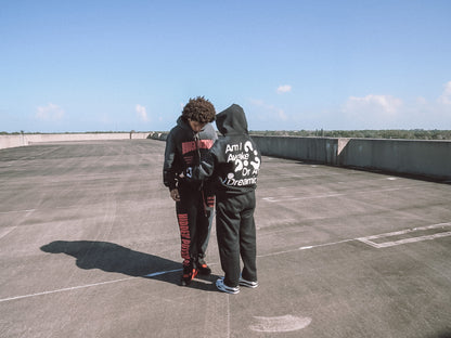 Black and red tracksuit